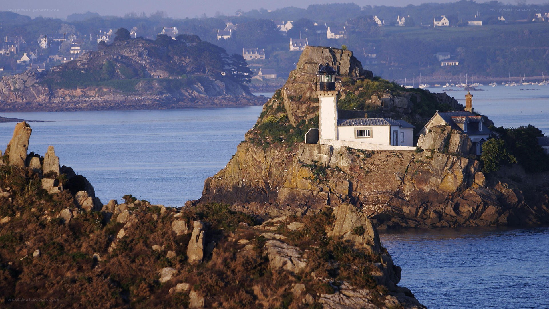 lighthouse on rocky island