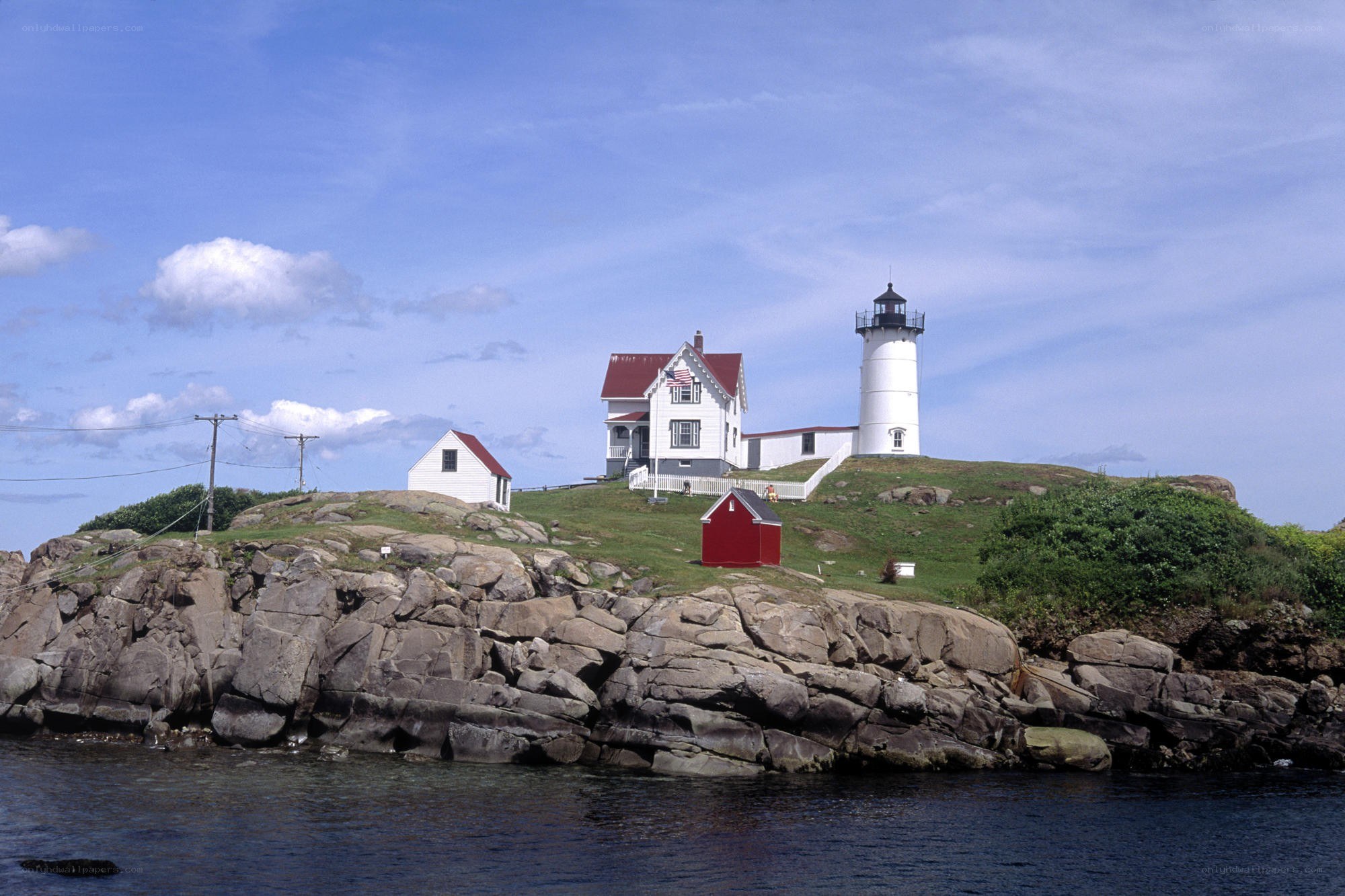 lighthouse on rocky island