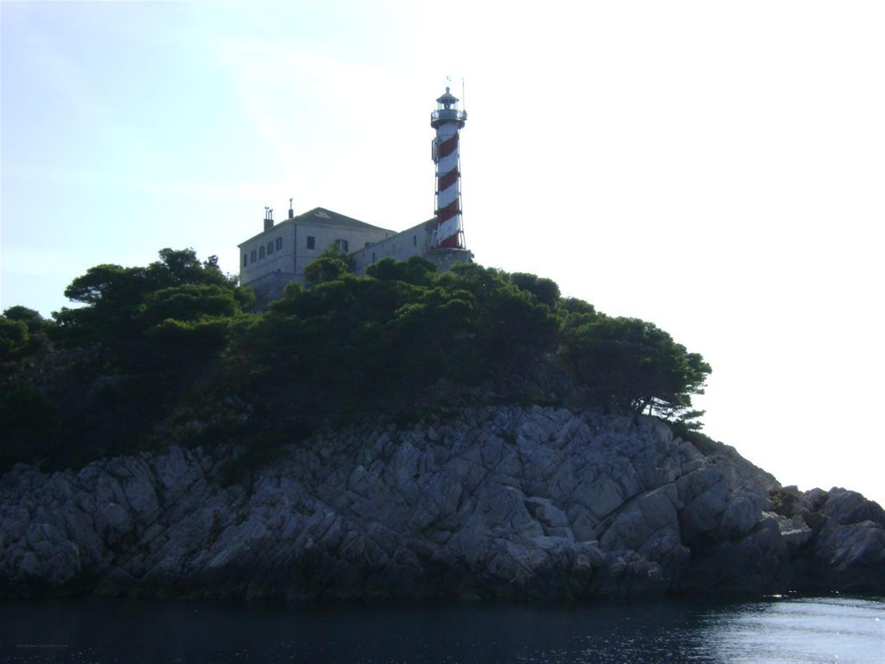 lighthouse on rocky island