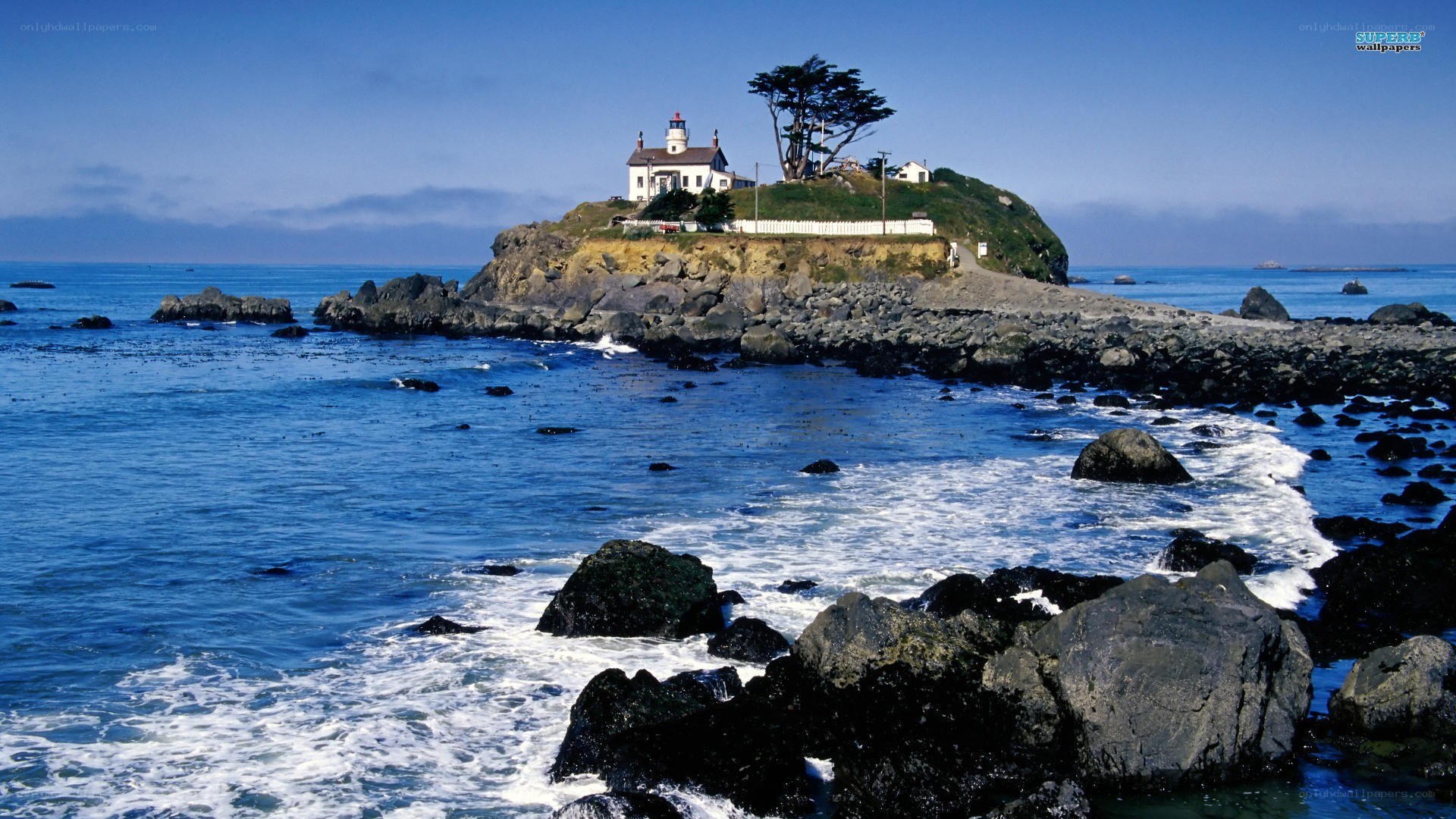 lighthouse on rocky island