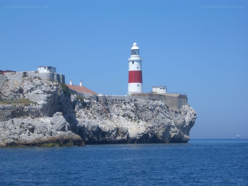 lighthouse on rocky island