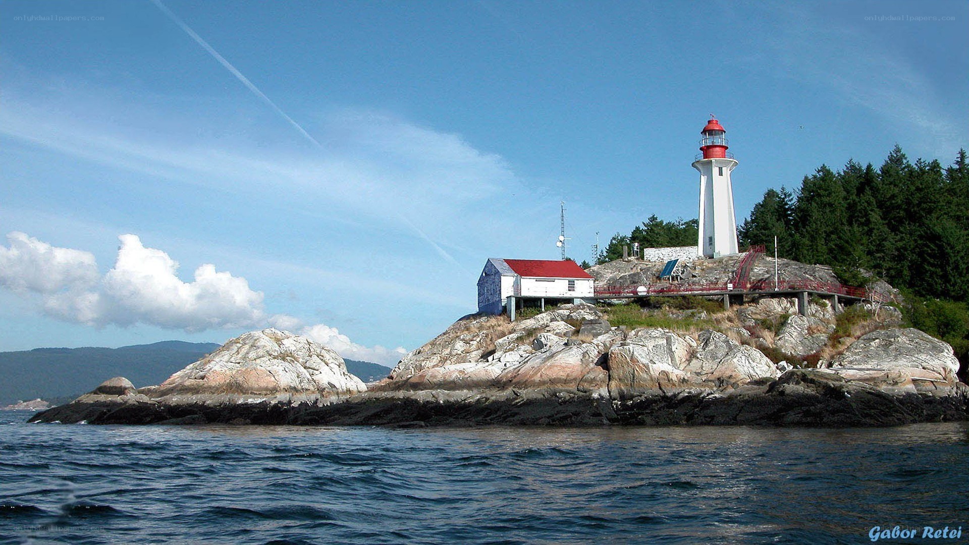lighthouse on rocky island