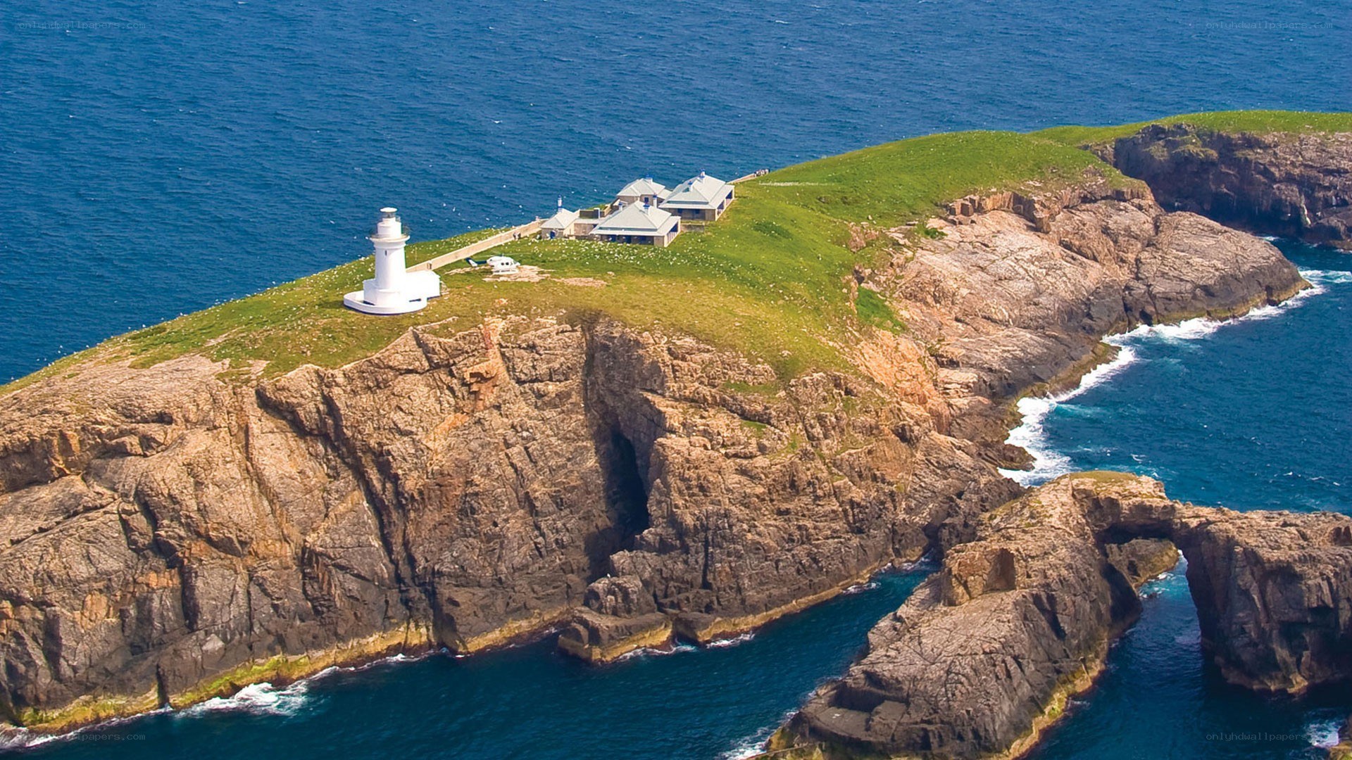 lighthouse on rocky island