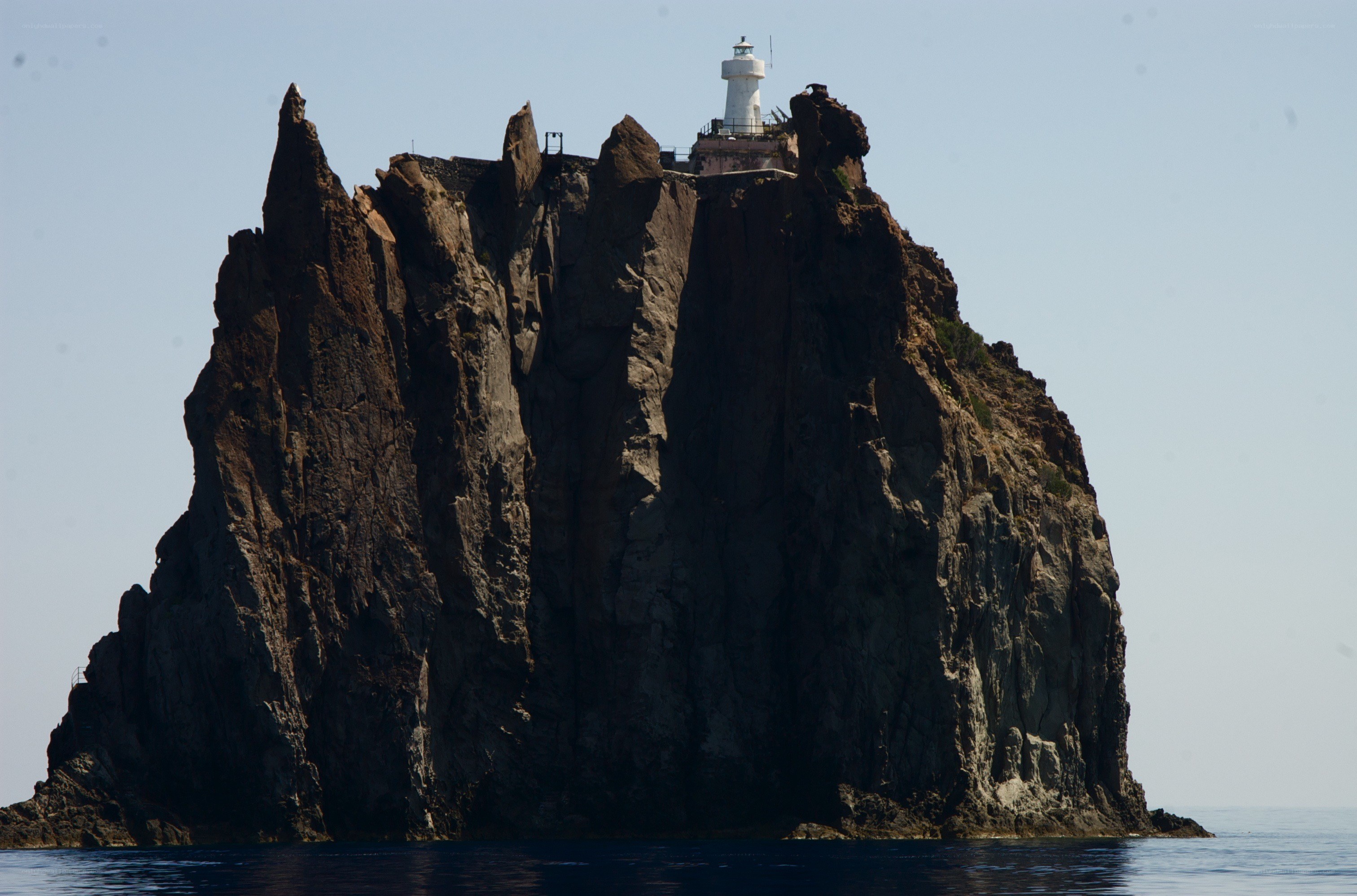 lighthouse on rocky island