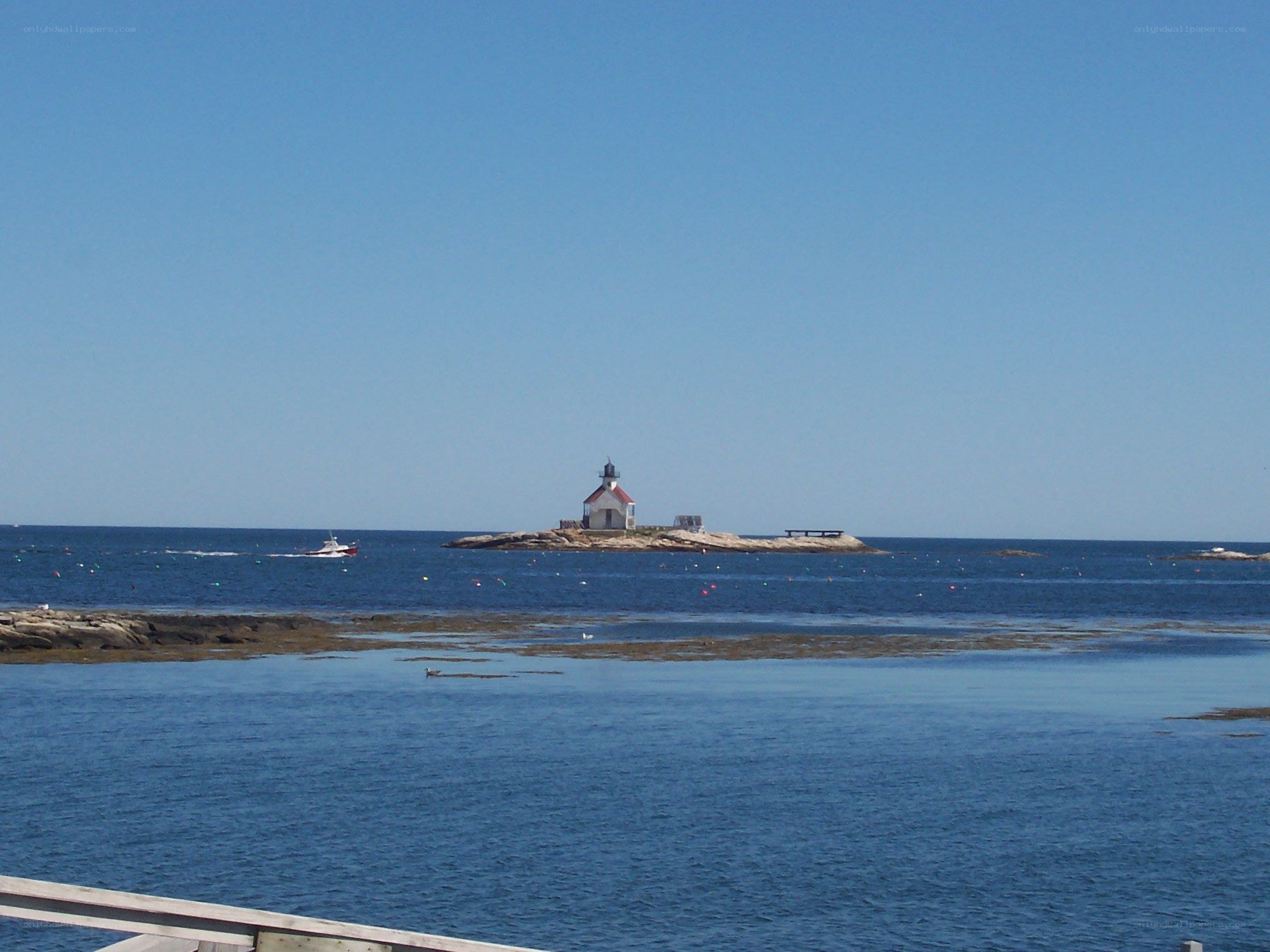 lighthouse on rocky island
