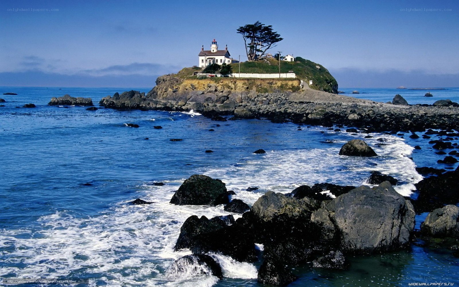 lighthouse on rocky island