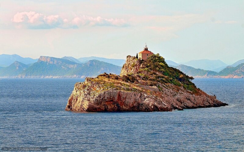 Lighthouse on rocky island
