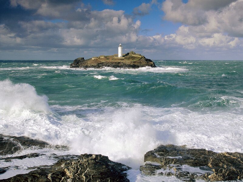 Lighthouse on Rocky Island — Blue, Dramatic, Afternoon, Photograph, Ocean, Waves, Clouds, Green, White