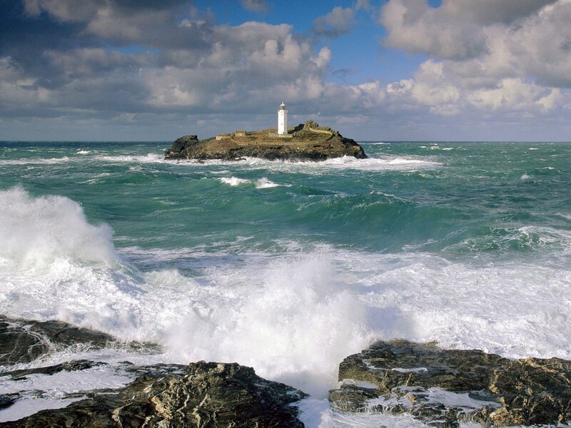 Lighthouse on Rocky Island — Blue, Dramatic, Afternoon, Photograph, Ocean, Waves, Clouds