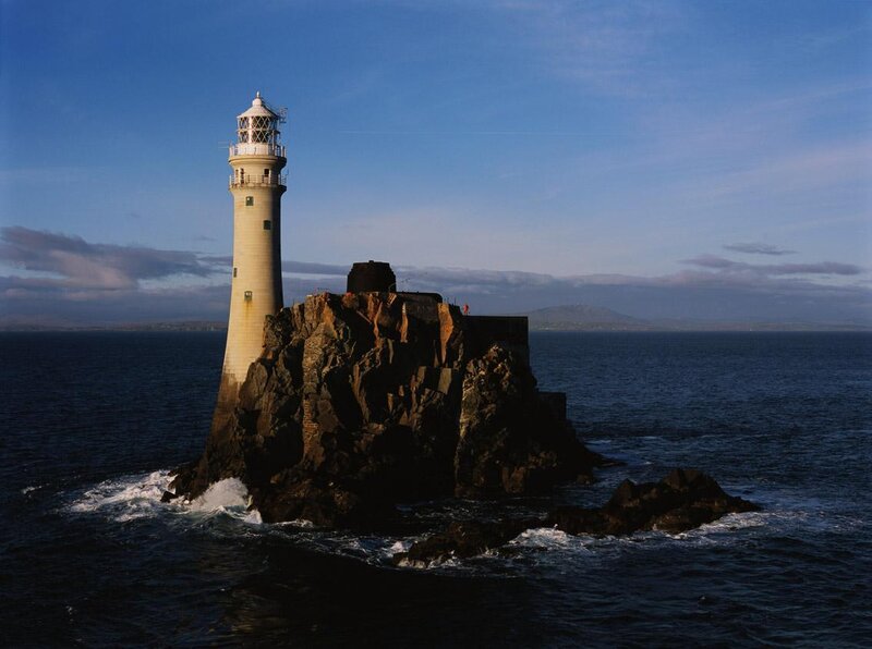 Lighthouse on Rocky Island — Blue, Dramatic, Afternoon