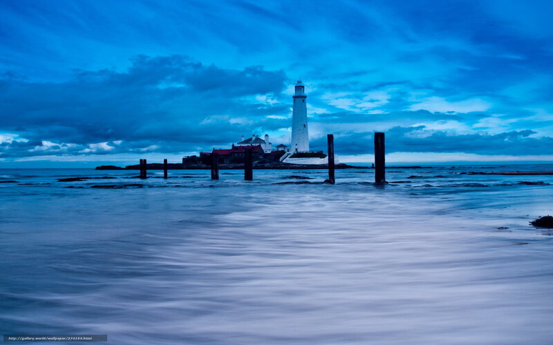 Lighthouse on Rocky Island — Blue, Dramatic, Night, Photograph, Clouds, Sea, Posts