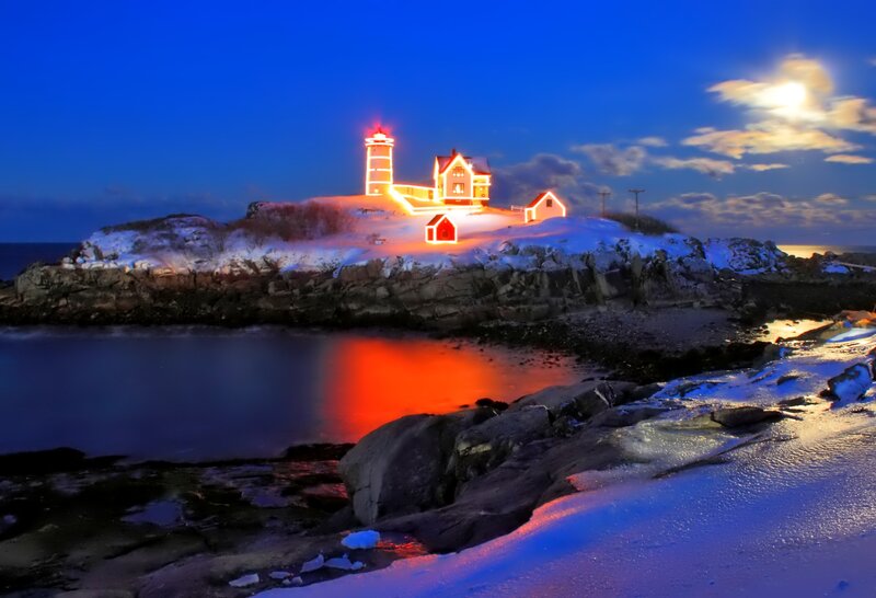 Lighthouse on Rocky Island — Blue, Dramatic, Night, Photograph, Snow