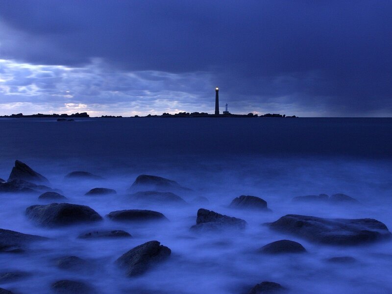 Lighthouse on Rocky Island — Blue, Dramatic, Night, Photograph