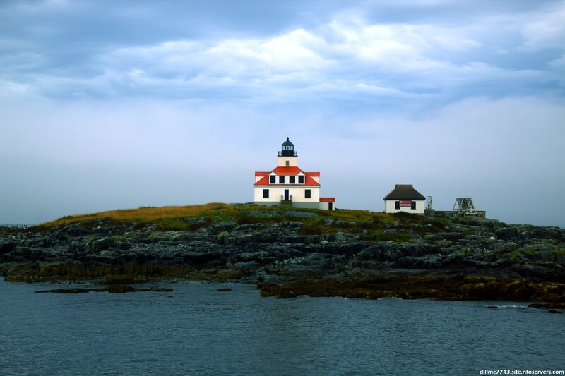 Lighthouse on Rocky Island — Blue, Dramatic, Photograph, Ocean, Sky