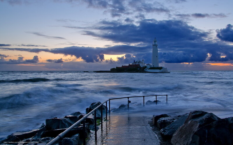 Lighthouse on Rocky Island — Blue, Dramatic, Sunset, Photograph, Ocean, Sky, Path