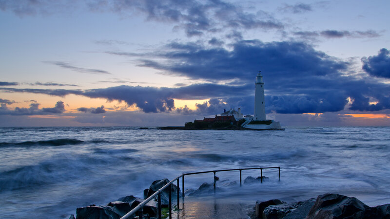 Lighthouse on Rocky Island — Blue, Dramatic, Sunset, Photograph, Ocean, Sky