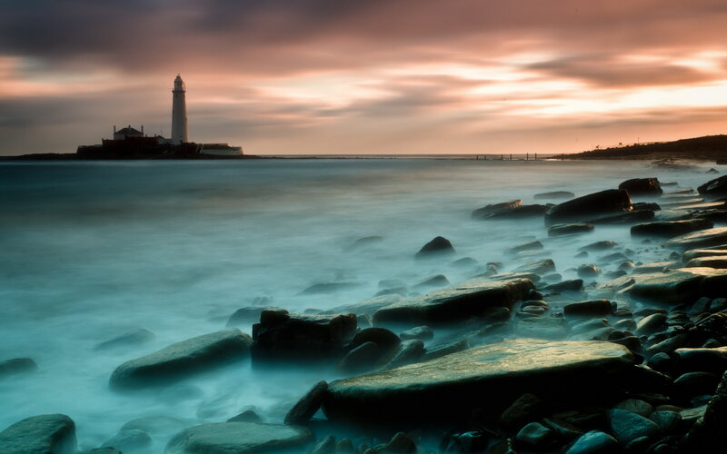 Lighthouse on Rocky Island — Blue, Dramatic, Sunset, Photograph, Ocean