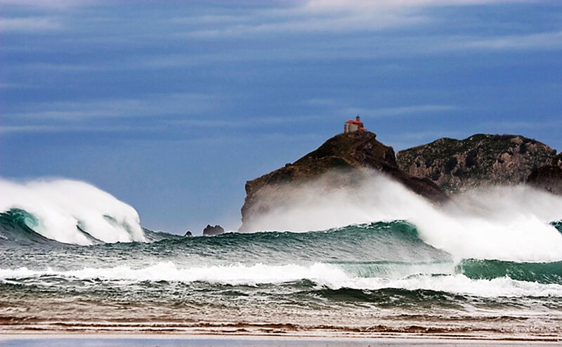 Lighthouse on Rocky Island — Blue, Dramatic