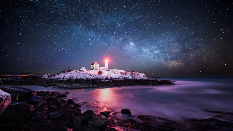 Lighthouse on Rocky Island — Blue, Serene, Night, Photograph, Starry Sky