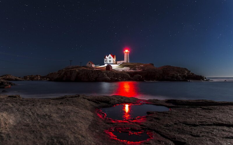 Lighthouse on Rocky Island — Dark Blue, Serene