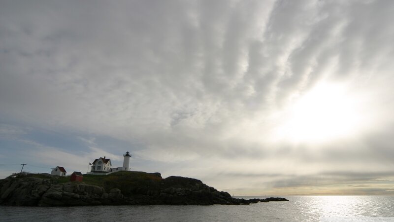 Lighthouse on Rocky Island — Gray, Dramatic, Afternoon