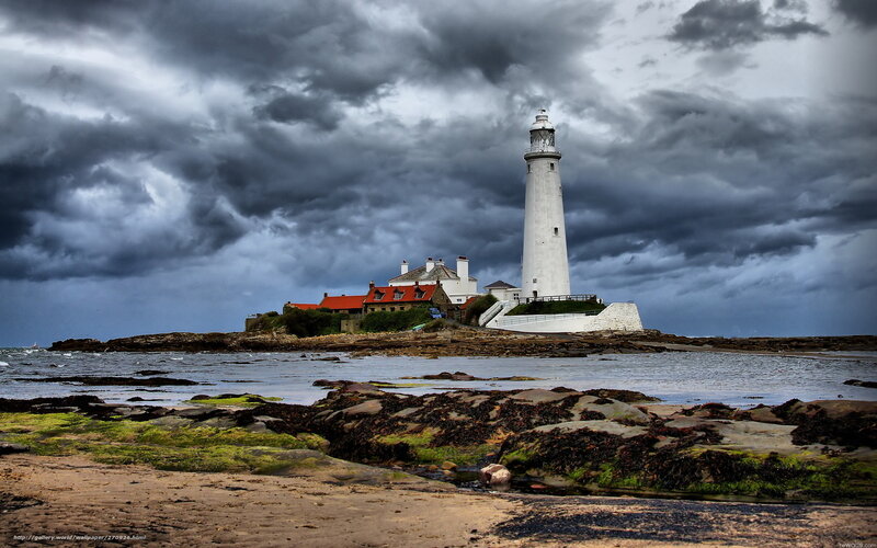 Lighthouse on Rocky Island — Gray, Dramatic, Photograph, Storm Clouds
