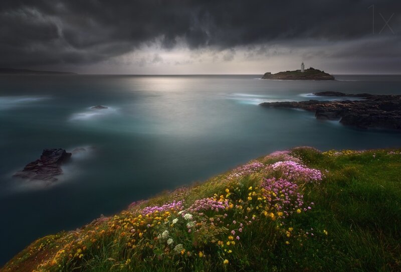 Lighthouse on Rocky Island — Green, Dramatic, Afternoon, Photograph