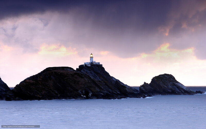 Lighthouse on Rocky Island — Purple, Dramatic, Sunset, Photograph