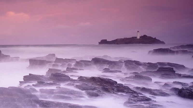 Lighthouse on Rocky Island — Purple, Serene, Sunset, Photograph, Ocean