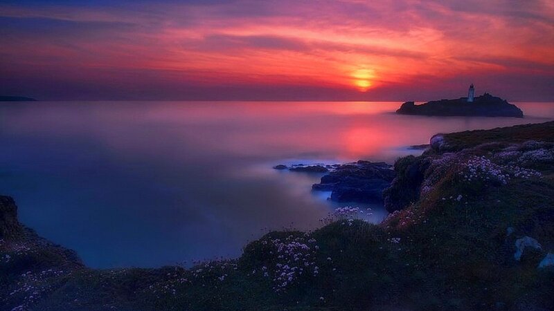 Lighthouse on Rocky Island — Red, Dramatic, Sunset, Photograph, Ocean