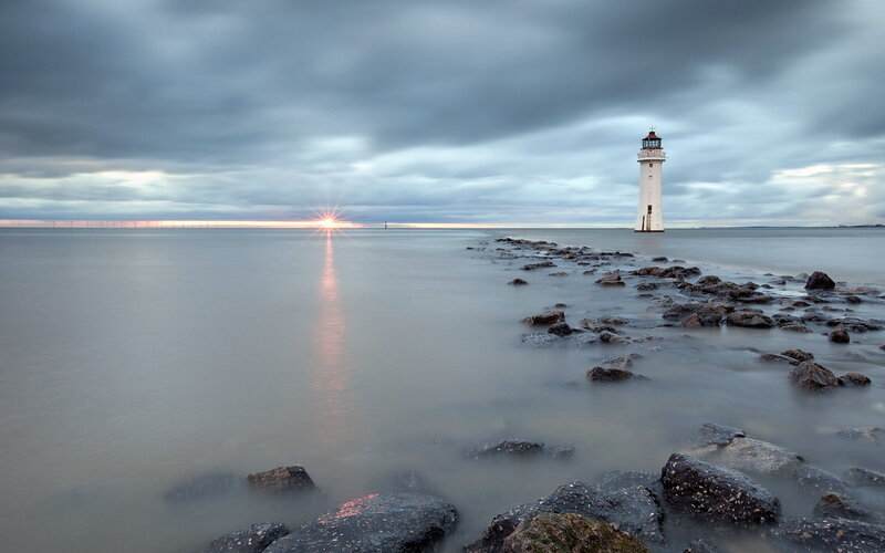 Lighthouse on Rocky Jetty — Gray