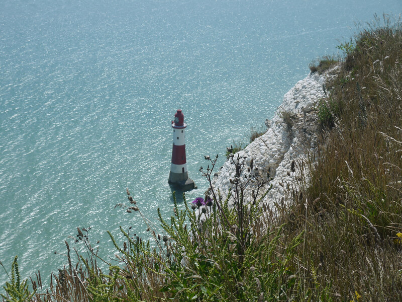 Lighthouse on Rocky Outcrop — Blue