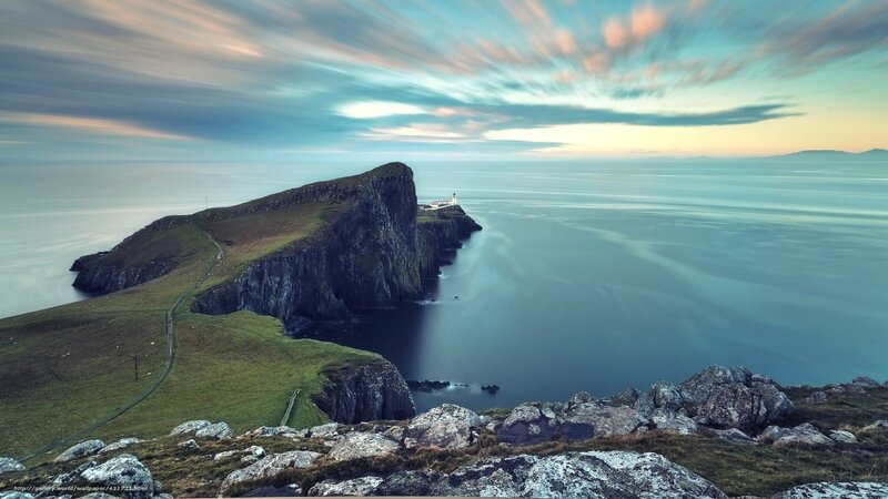Lighthouse on Rocky Peninsula — Blue, Serene
