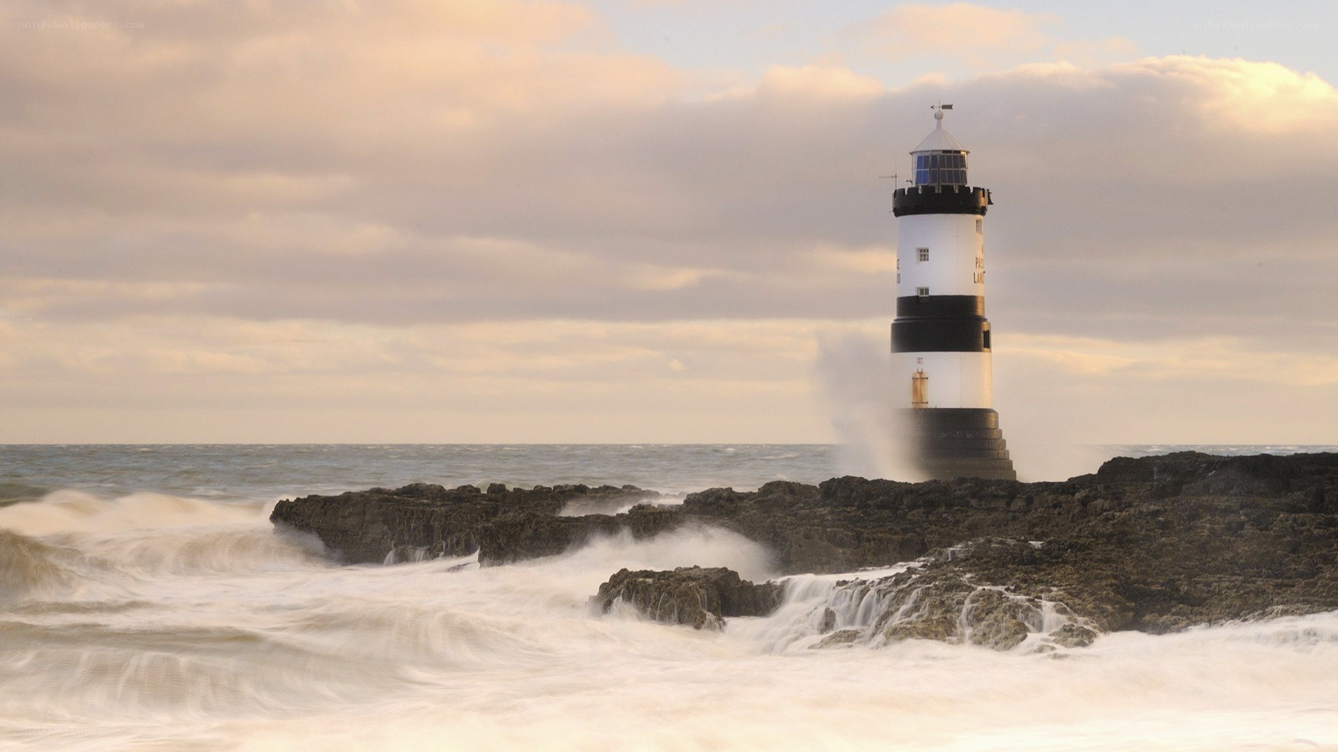 Lighthouse on rocky shore