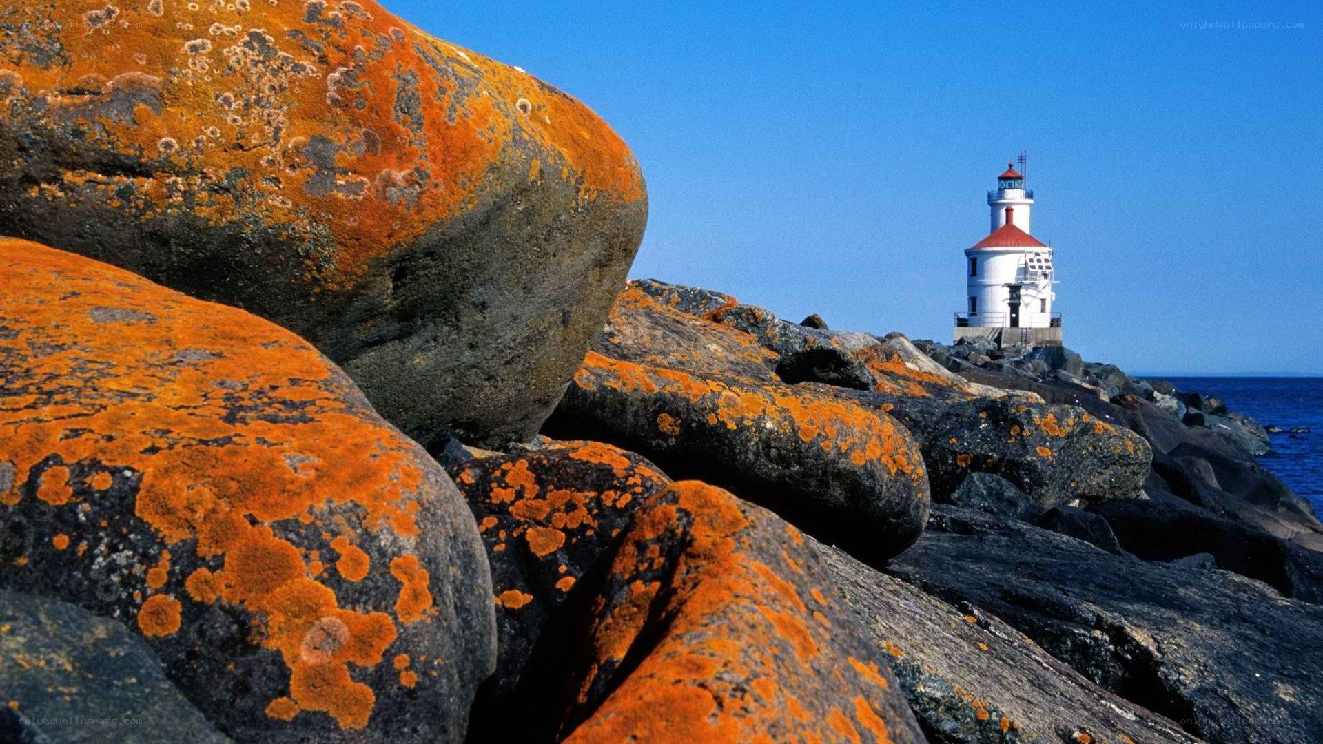 Lighthouse on rocky shore