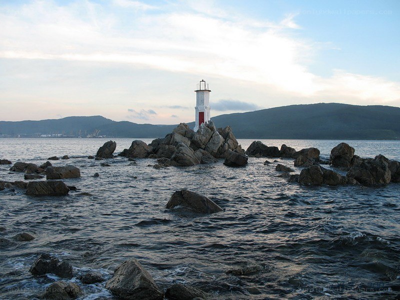 Lighthouse on rocky shore