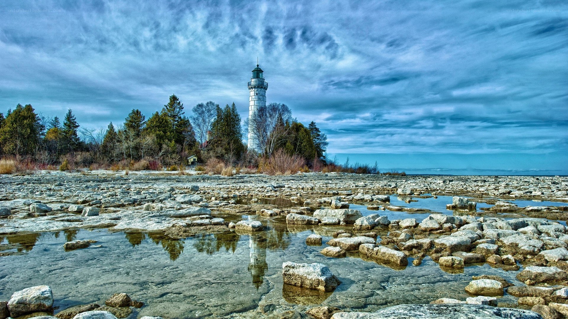 Lighthouse on rocky shore
