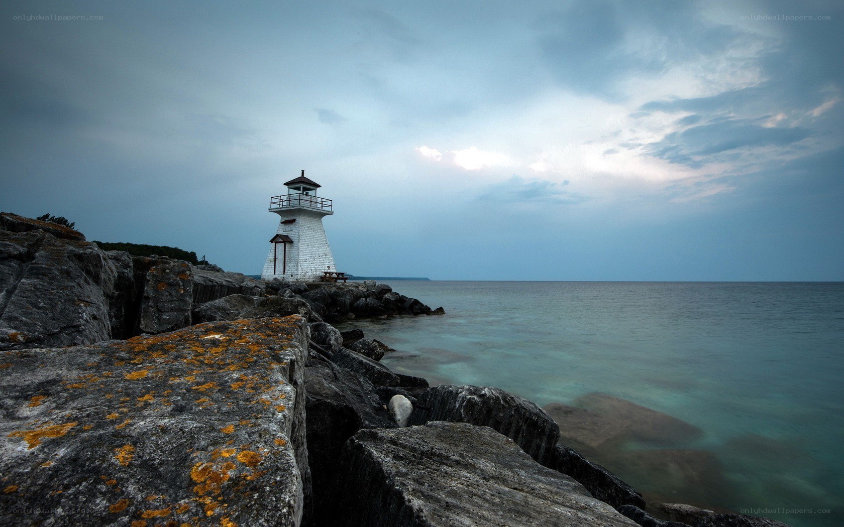 Lighthouse on rocky shore