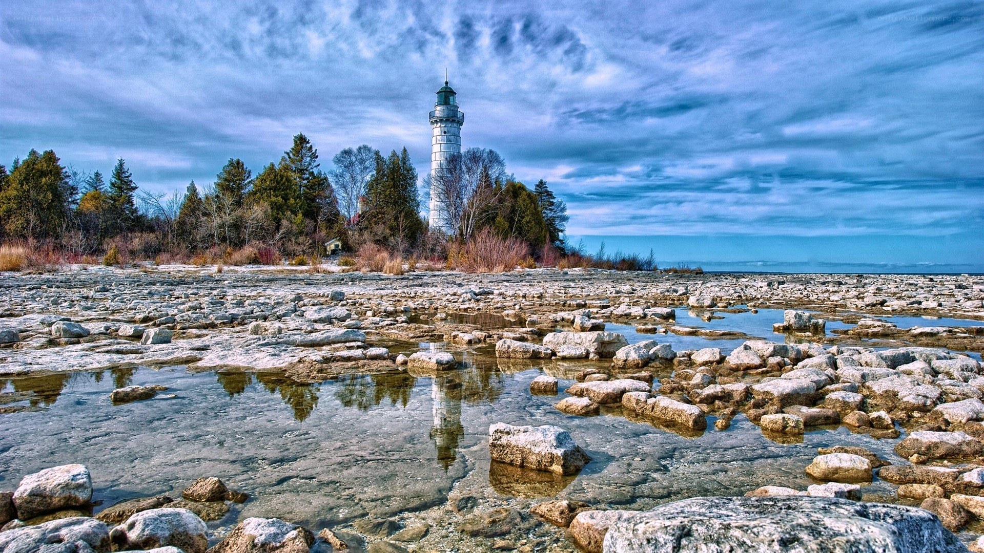 lighthouse on rocky shore