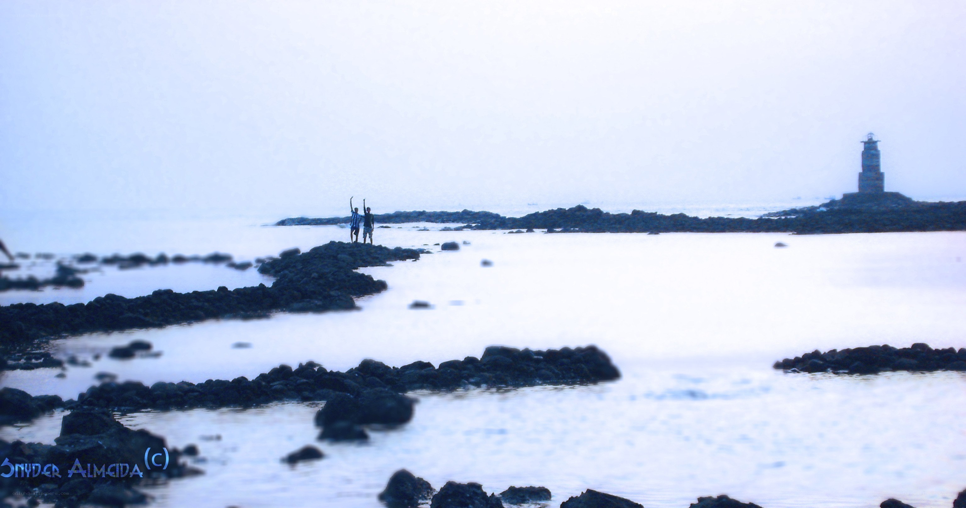 Lighthouse on rocky shore