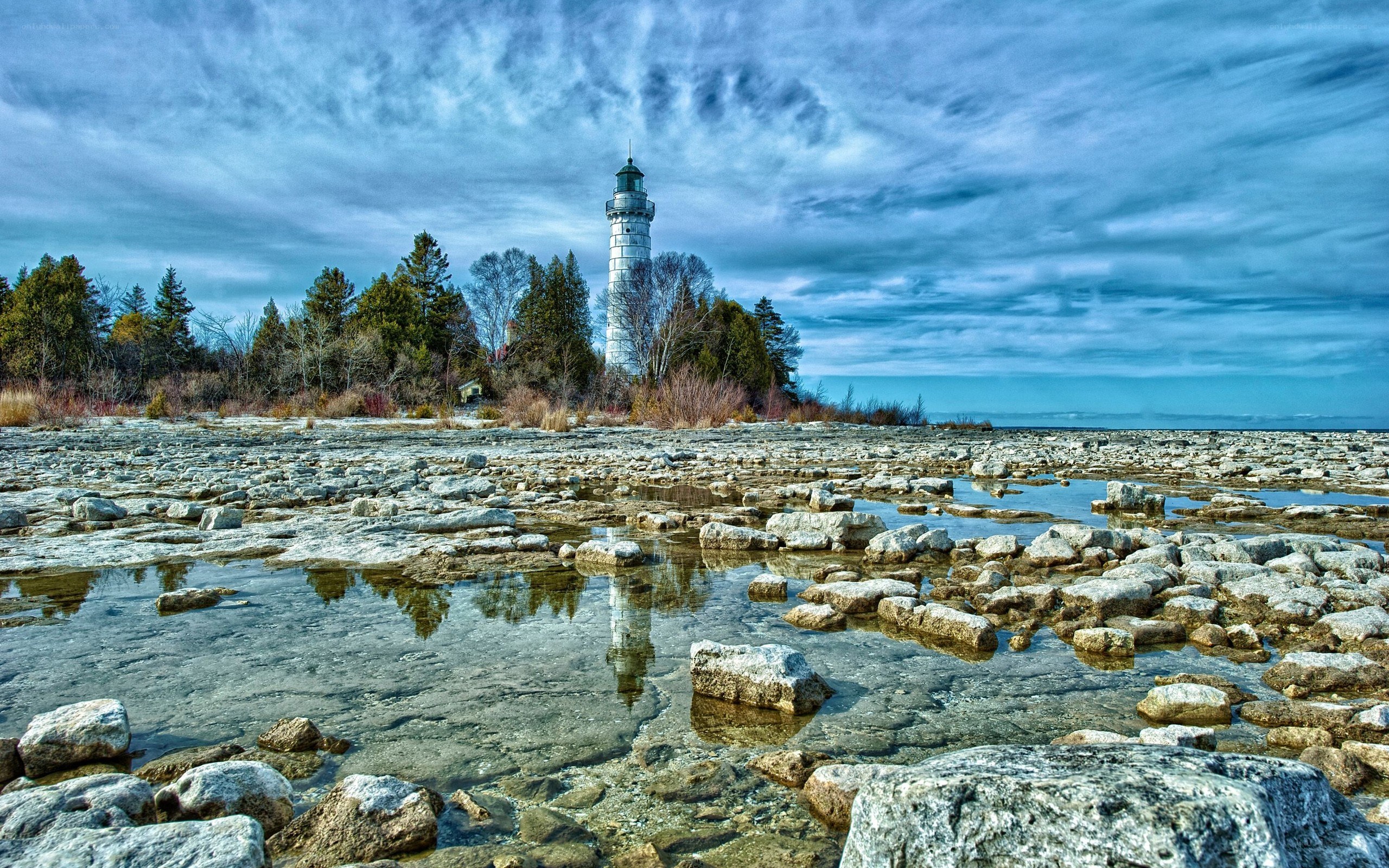 Lighthouse on rocky shore