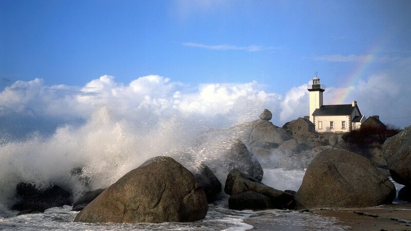 Lighthouse on Rocky Shore — Blue, Dramatic, Afternoon, Photograph, Waves
