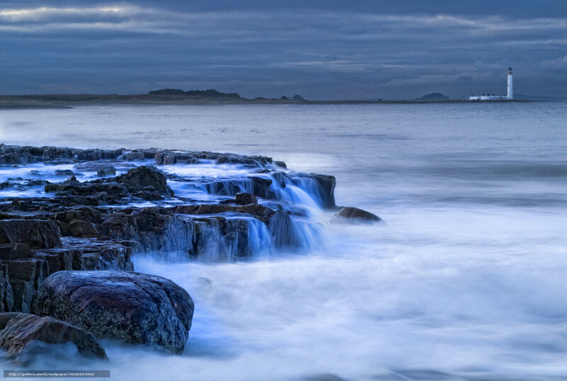 Lighthouse on Rocky Shore — Blue, Dramatic, Night, Photograph, Ocean, Rocks, Clouds