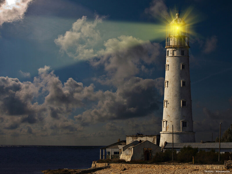 Lighthouse on Rocky Shore — Blue, Dramatic, Night, Photograph, Ocean