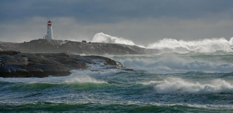 Lighthouse on Rocky Shore — Blue, Dramatic, Photograph