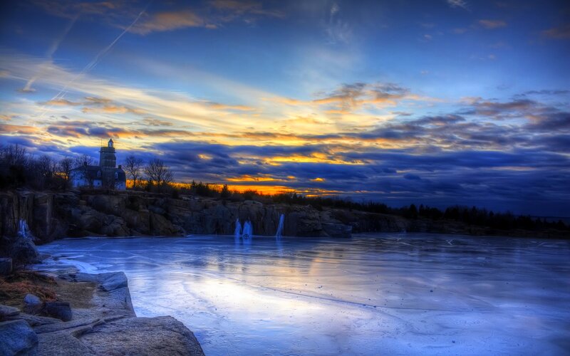 Lighthouse on Rocky Shore — Blue, Dramatic, Winter