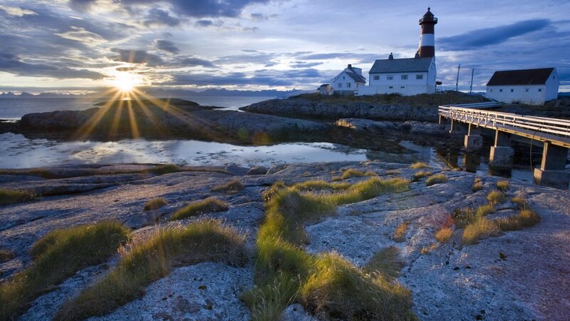 Lighthouse on Rocky Shore — Blue, Serene, Sunset, Photograph, Sunrise, Sea