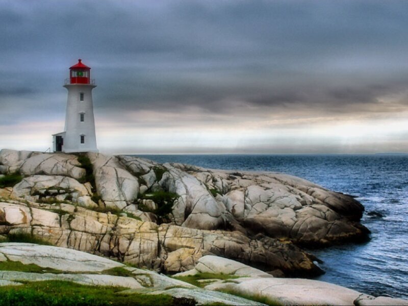 Lighthouse on Rocky Shore — Gray, Dramatic, Afternoon, Photograph