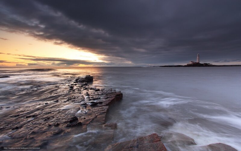 Lighthouse on Rocky Shore — Gray, Dramatic, Sunset, Photograph, Ocean, Sky, Rocks