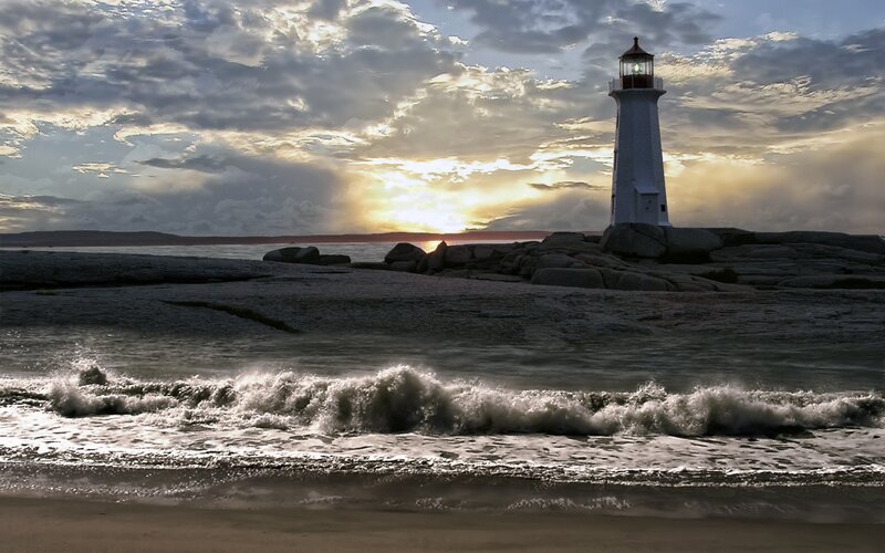 Lighthouse on Rocky Shore — Gray, Dramatic, Sunset, Photograph, Ocean Waves